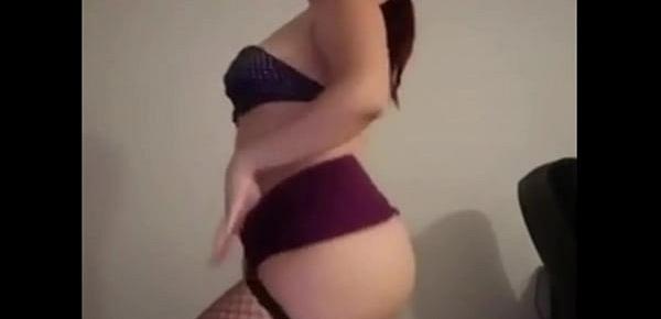  brunette dances in front of webcam